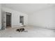 Open room has smooth white walls, neutral floors, and access to an en suite bathroom at 1145 Kingston Drive, Atlanta, GA 30342