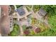 Aerial shot of landscaped backyard, featuring patios, gardens, and a tranquil water feature at 1434 Churchill Way, Marietta, GA 30062