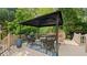 Inviting deck featuring comfortable outdoor seating under a stylish gazebo, perfect for relaxing and entertaining guests at 1434 Churchill Way, Marietta, GA 30062