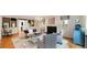 Elegant living room with hardwood floors, fireplace, built-in bookshelves, and ample seating at 1434 Churchill Way, Marietta, GA 30062