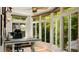 Bright home office with multiple windows providing backyard views, and hardwood floors at 1434 Churchill Way, Marietta, GA 30062
