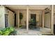 Cozy covered patio with outdoor seating, perfect for dining, and a charming decorative welcome sign at 1434 Churchill Way, Marietta, GA 30062