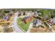 Aerial shot showcases the neighborhood's lush landscaping, mature trees, and well-maintained homes at 1694 Jamie Leigh Ct, Snellville, GA 30078