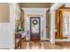 Inviting foyer featuring hardwood floors and a decorative front door at 1694 Jamie Leigh Ct, Snellville, GA 30078