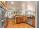 Eat-in kitchen features stainless steel appliances, granite countertops, and an open floor plan at 1694 Jamie Leigh Ct, Snellville, GA 30078