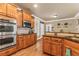 Well-lit kitchen boasts stainless steel appliances, granite countertops, and ample cabinet space at 1694 Jamie Leigh Ct, Snellville, GA 30078