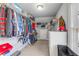 Bright walk-in closet with ample shelving, hanging space, and convenient storage solutions at 1694 Jamie Leigh Ct, Snellville, GA 30078