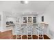 Stylish bar area features elegant seating, custom cabinetry, and a spacious layout perfect for entertaining guests at 2135 Glenfield Trce, Cumming, GA 30041