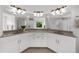 Modern bathroom with double vanity sinks and granite countertops at 2135 Glenfield Trce, Cumming, GA 30041