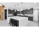 Modern kitchen featuring an island, stainless steel appliances, and sleek cabinetry at 2135 Glenfield Trce, Cumming, GA 30041