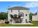 Home exterior with a deck overlooking backyard at 3073 Hopeland Dr, Powder Springs, GA 30127