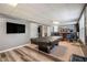 Basement featuring a pool table, tv, bar area, and varied flooring at 3073 Hopeland Dr, Powder Springs, GA 30127