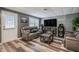 Finished basement features a large screen tv, sound system, and gas fireplace at 3073 Hopeland Dr, Powder Springs, GA 30127