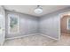 Clean bedroom with carpet and neutral gray walls at 3073 Hopeland Dr, Powder Springs, GA 30127