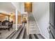 Inviting foyer with hardwood floors, staircase, and an open view into the living room and dining area at 3073 Hopeland Dr, Powder Springs, GA 30127