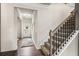 Welcoming foyer with wood floors, staircase, and natural light, creating a warm entrance at 323 Silver Leaf Trce, Douglasville, GA 30134