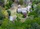 Birds eye view of a secluded home showcasing its large yard and mature landscaping at 4445 Moon Station Nw Ln, Acworth, GA 30101