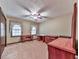 Bedroom with carpet floors, windows, and furniture at 4445 Moon Station Nw Ln, Acworth, GA 30101