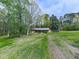 Property includes a large lawn and detached structure at 4445 Moon Station Nw Ln, Acworth, GA 30101