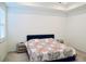 Bright bedroom featuring a queen-sized bed and neutral decor at 4734 Dewitt Dr, Duluth, GA 30097