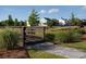 Scenic community walkway with lush landscaping, inviting residents to enjoy nature at 4734 Dewitt Dr, Duluth, GA 30097