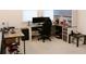 Upstairs office area with computer setup, filing cabinets, and natural light at 4734 Dewitt Dr, Duluth, GA 30097