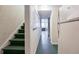 Hallway with stairs and view of an office space at 558 Auburn Rd, Auburn, GA 30011