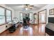 Well-lit office space featuring hardwood floors, plenty of room, and natural light at 558 Auburn Rd, Auburn, GA 30011