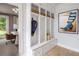 Organized mudroom with built-in storage, seating, and stylish decor at 1432 Wicker Wood Se Pl # 9, Smyrna, GA 30080