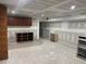Unfinished basement with recessed lighting and ample storage space, awaiting personalization at 2256 Mack Rd, Douglasville, GA 30135
