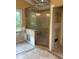 Elegant bathroom with a frameless glass walk-in shower and tile accents, offering a spa-like experience at 2256 Mack Rd, Douglasville, GA 30135