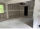 Dining room with open floor plan, new drywall, and doorway to another room at 2256 Mack Rd, Douglasville, GA 30135
