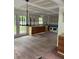 Dining room with hardwood floors and a modern chandelier, ready for hosting guests at 2256 Mack Rd, Douglasville, GA 30135