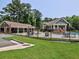 Community pool with a covered cabana and fenced for security at 2308 Littlebrooke Dr, Dunwoody, GA 30338