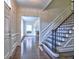 Elegant foyer features hardwood floors, a staircase, and views into the formal living room at 2308 Littlebrooke Dr, Dunwoody, GA 30338
