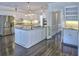 Well-equipped kitchen featuring granite counters, stainless steel appliances, and hardwood floors at 2308 Littlebrooke Dr, Dunwoody, GA 30338
