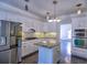 Stylish kitchen features modern appliances, granite countertops, and hardwood floors at 2308 Littlebrooke Dr, Dunwoody, GA 30338