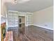 Bright living room with hardwood floors, fireplace, and custom built-in bookshelves at 2308 Littlebrooke Dr, Dunwoody, GA 30338