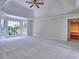 Spacious main bedroom with tray ceiling and abundant natural light at 2308 Littlebrooke Dr, Dunwoody, GA 30338