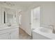 Bright bathroom featuring double vanity, and plenty of natural light at 1147 Trident Maple Chase, Lawrenceville, GA 30045