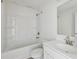 Bathroom with tiled shower and tub combination and a single sink vanity at 1147 Trident Maple Chase, Lawrenceville, GA 30045