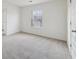 This bedroom has neutral carpet and a double door closet at 1147 Trident Maple Chase, Lawrenceville, GA 30045
