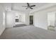 Spacious bedroom with fireplace, ceiling fan, and ensuite bath at 1147 Trident Maple Chase, Lawrenceville, GA 30045