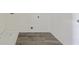 A utility sink with a modern tiled floor at 1147 Trident Maple Chase, Lawrenceville, GA 30045