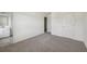 Bright main bedroom features neutral carpet and a ensuite bathroom at 1147 Trident Maple Chase, Lawrenceville, GA 30045