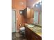 Traditional bathroom featuring granite countertop, matching cabinets and a comfort height toilet at 133 Titan Rd, Stockbridge, GA 30281