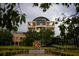 Kennesaw State University building framed by trees and the university's emblem at 1923 Cassia Aly, Kennesaw, GA 30144