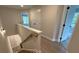 Upstairs hallway with hardwood floors leading to bedrooms and closets at 1923 Cassia Aly, Kennesaw, GA 30144