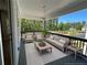 Comfortable outdoor patio with cozy seating and a beautiful view of the surrounding greenery at 1923 Cassia Aly, Kennesaw, GA 30144