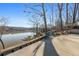 Backyard patio with a dock, hammock, and lake access at 405 Miller Rd, Covington, GA 30014
